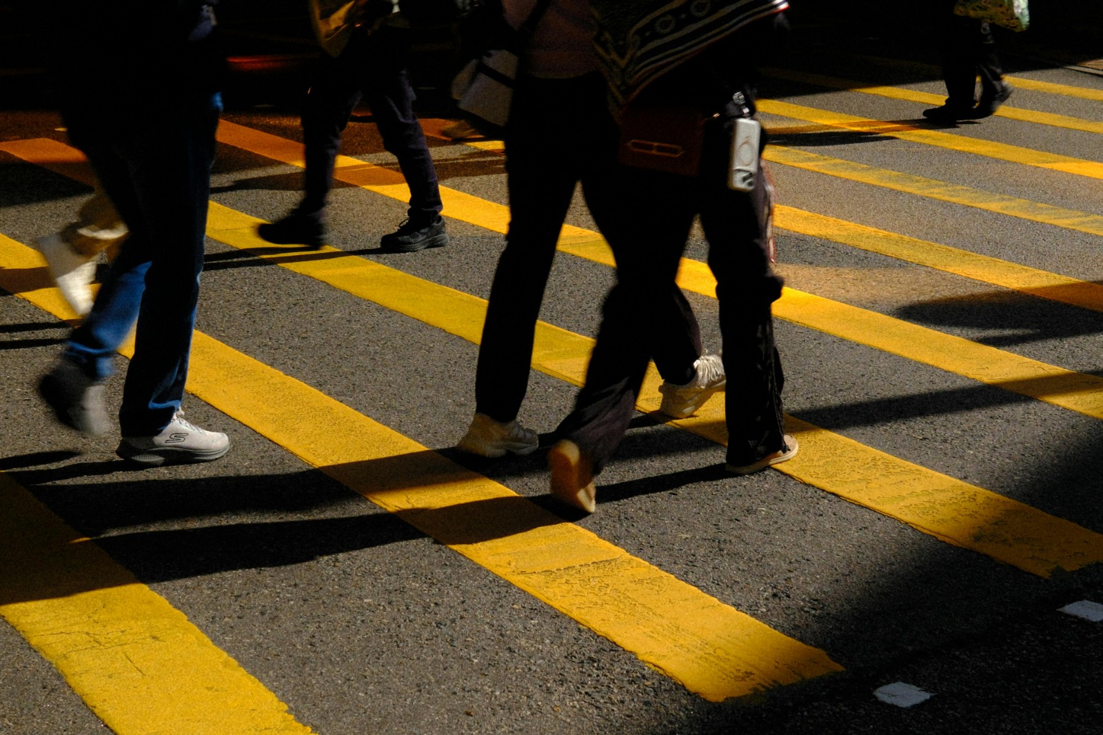 Students walking home along a dimly lit road